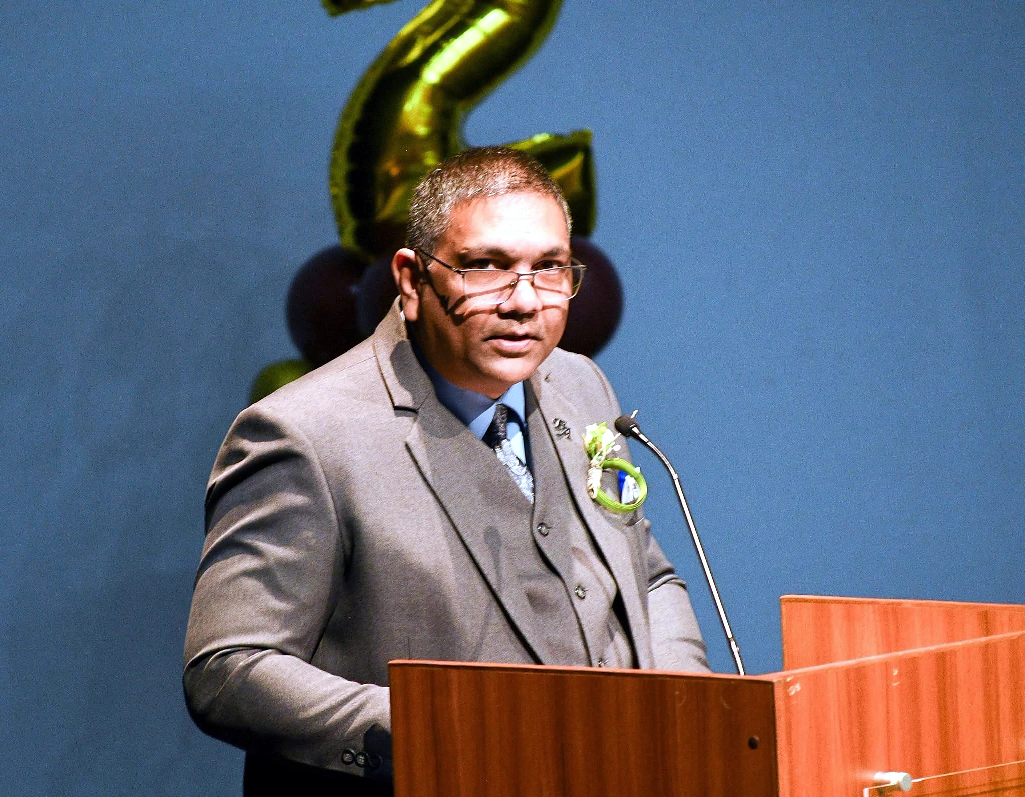 Mr. Faeid Ali addressing the ceremony from the podium